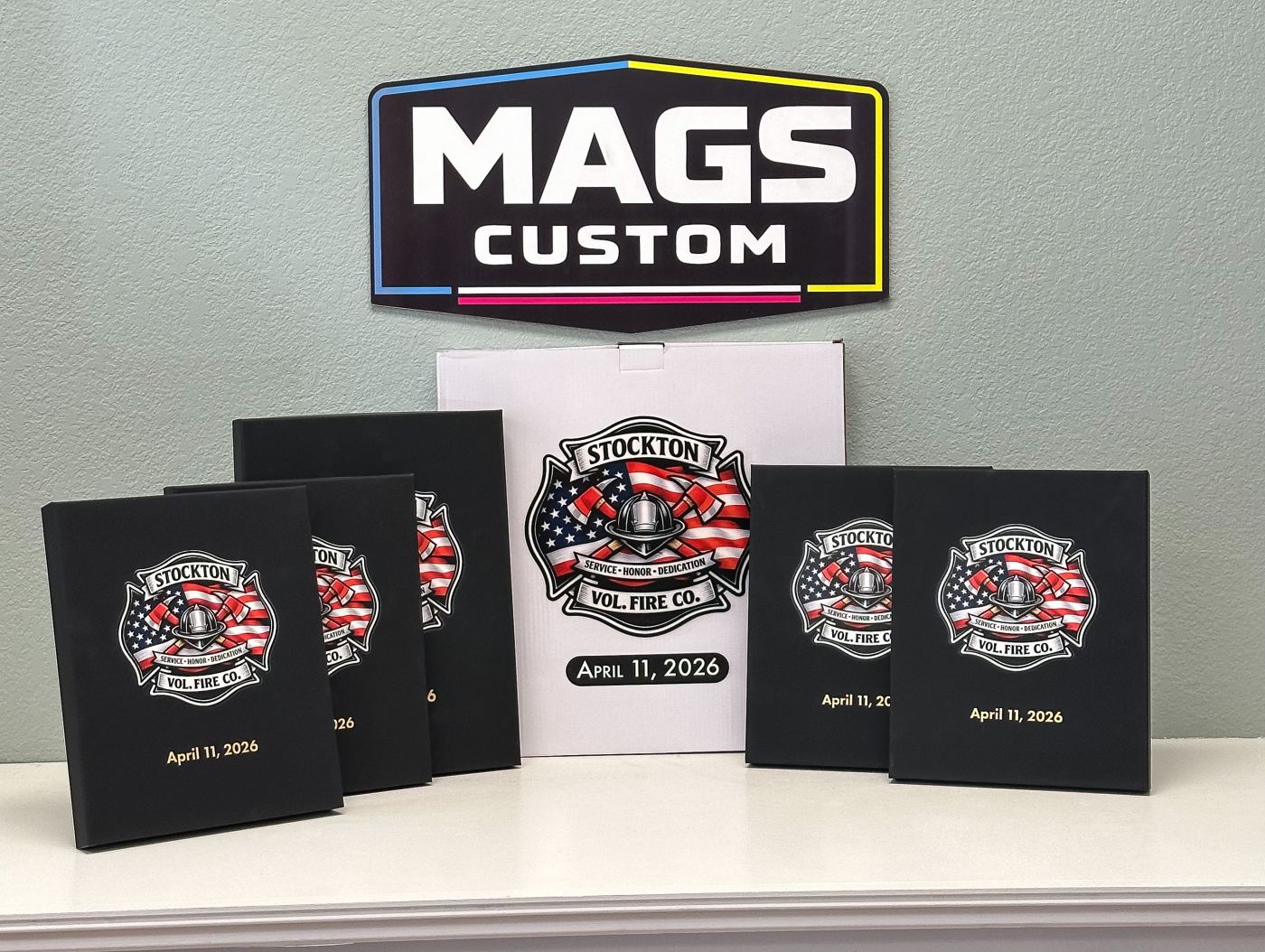 Stockton Volunteer Fire Company plaques coming off the UV printer, fire background design with department badge