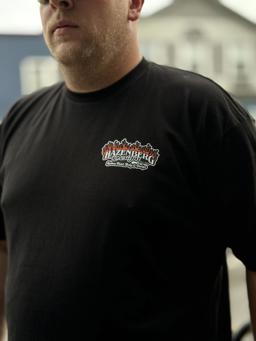 Hazenberg Designs left chest DTF logo print on black Tultex 202 ring-spun cotton t-shirt
