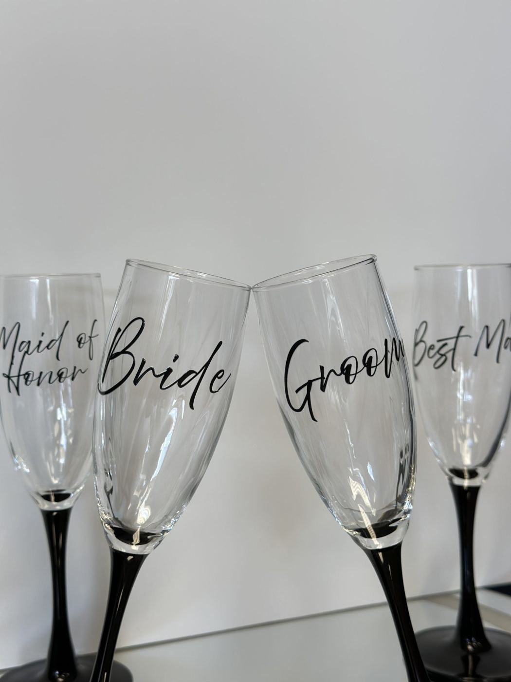 Custom laser-engraved champagne glasses for weddings and events by Mags Custom, Frewsburg NY